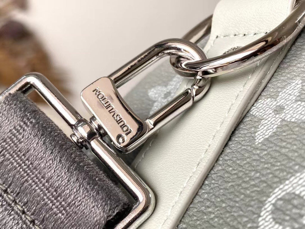 KEEPALL BANDOULIÈRE 25 EN TOILE GRIS MONOGRAMME DÉGRADÉ