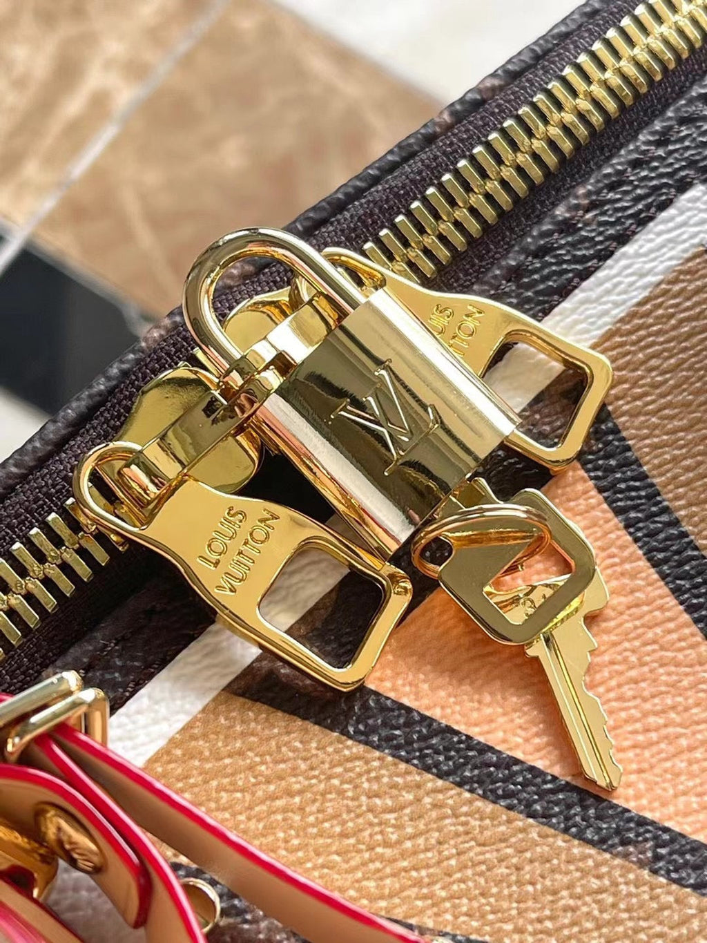 KEEPALL BANDOULIÈRE 50 EN TOILE MONOGRAMME MOTIF PARFLECHE