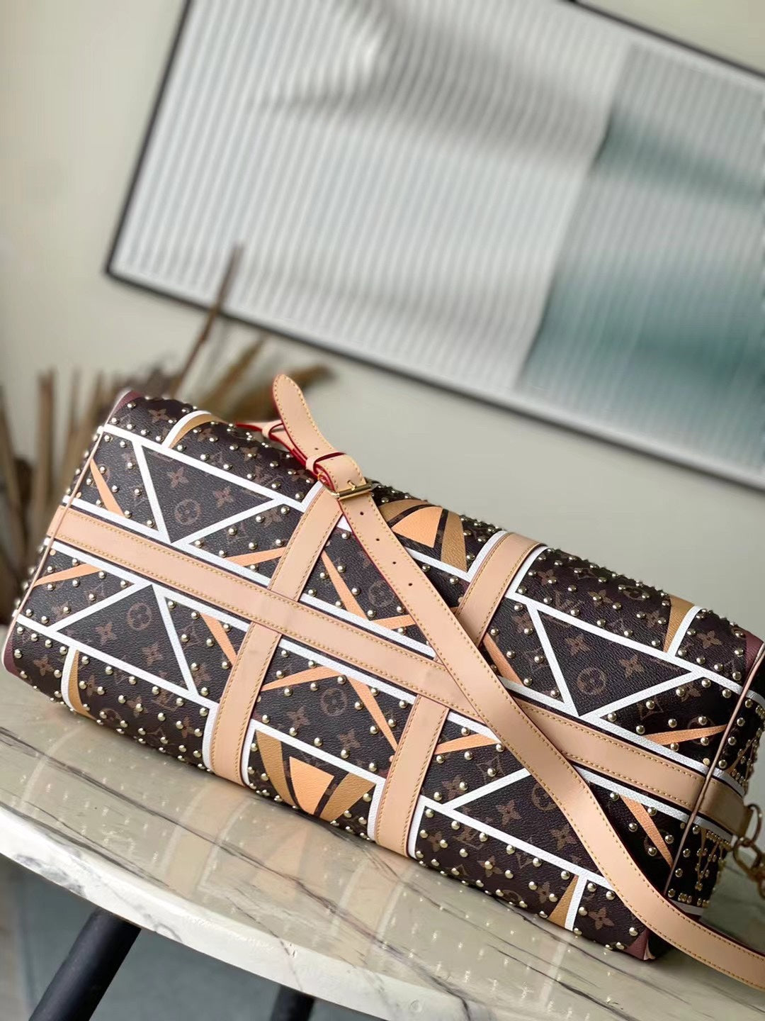 KEEPALL BANDOULIÈRE 50 EN TOILE MONOGRAMME MOTIF PARFLECHE