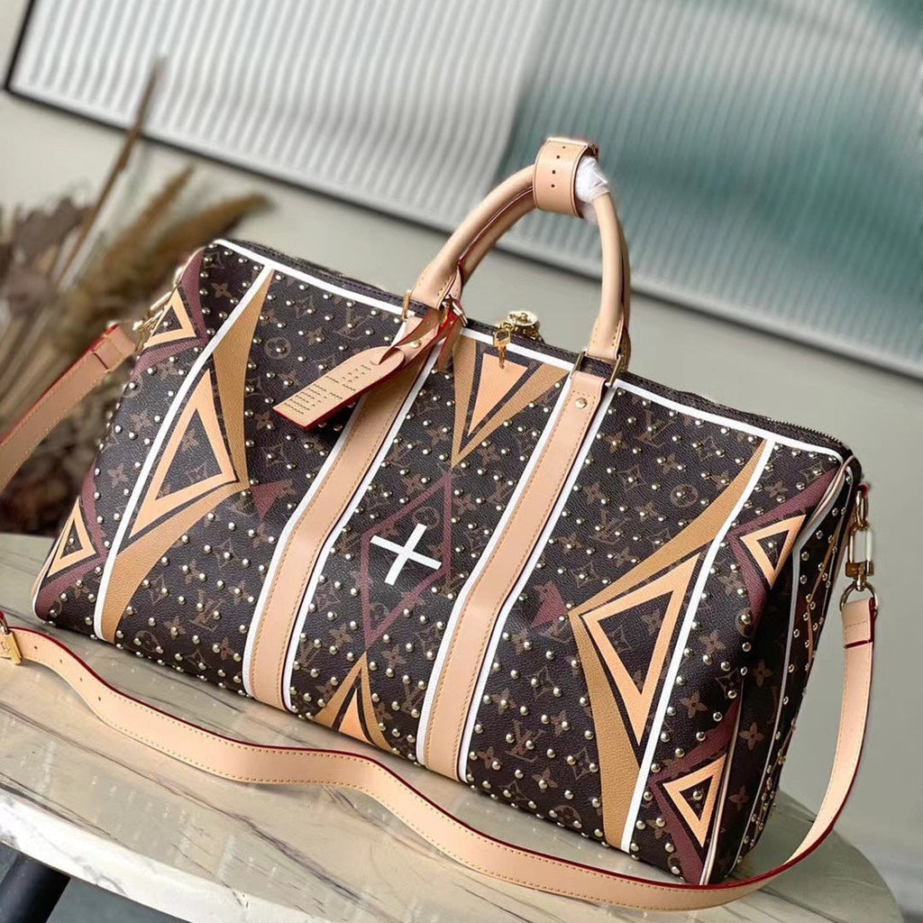 KEEPALL BANDOULIÈRE 50 EN TOILE MONOGRAMME MOTIF PARFLECHE