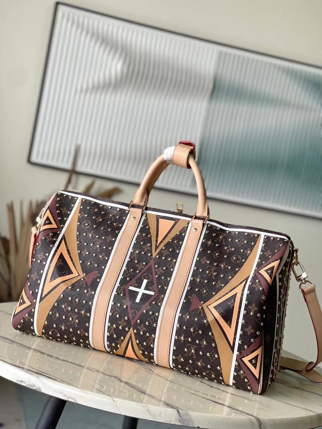 KEEPALL BANDOULIÈRE 50 EN TOILE MONOGRAMME MOTIF PARFLECHE