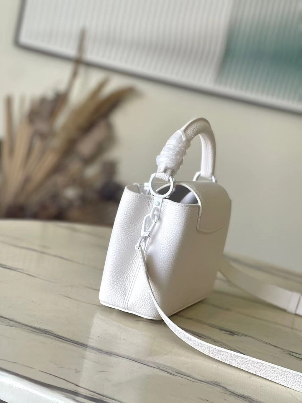 CAPUCINES EST-OUEST MINI 21 EN TAURILLON BLANC