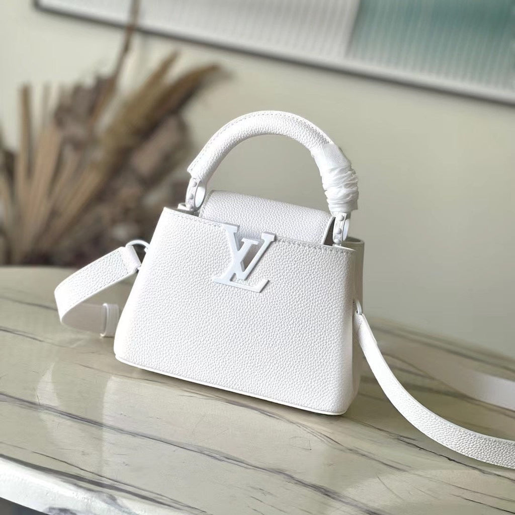 CAPUCINES EST-OUEST MINI 21 EN TAURILLON BLANC