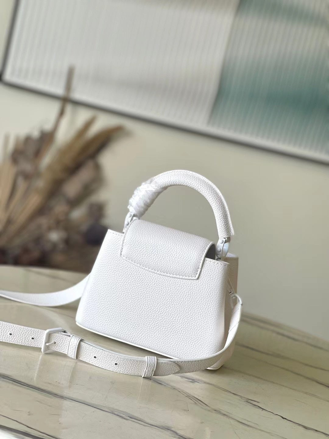 CAPUCINES EST-OUEST MINI 21 EN TAURILLON BLANC