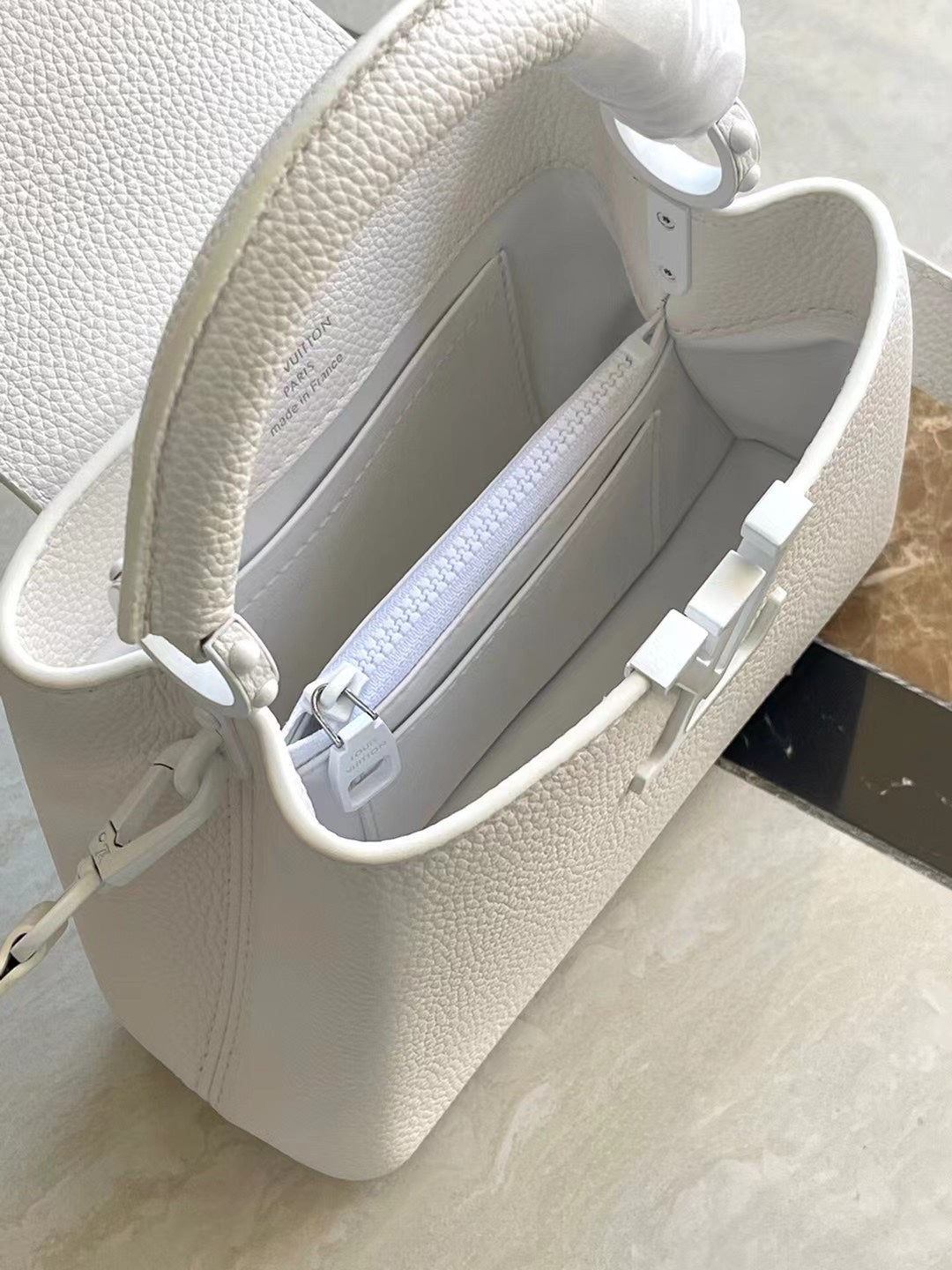 CAPUCINES EST-OUEST MINI 21 EN TAURILLON BLANC