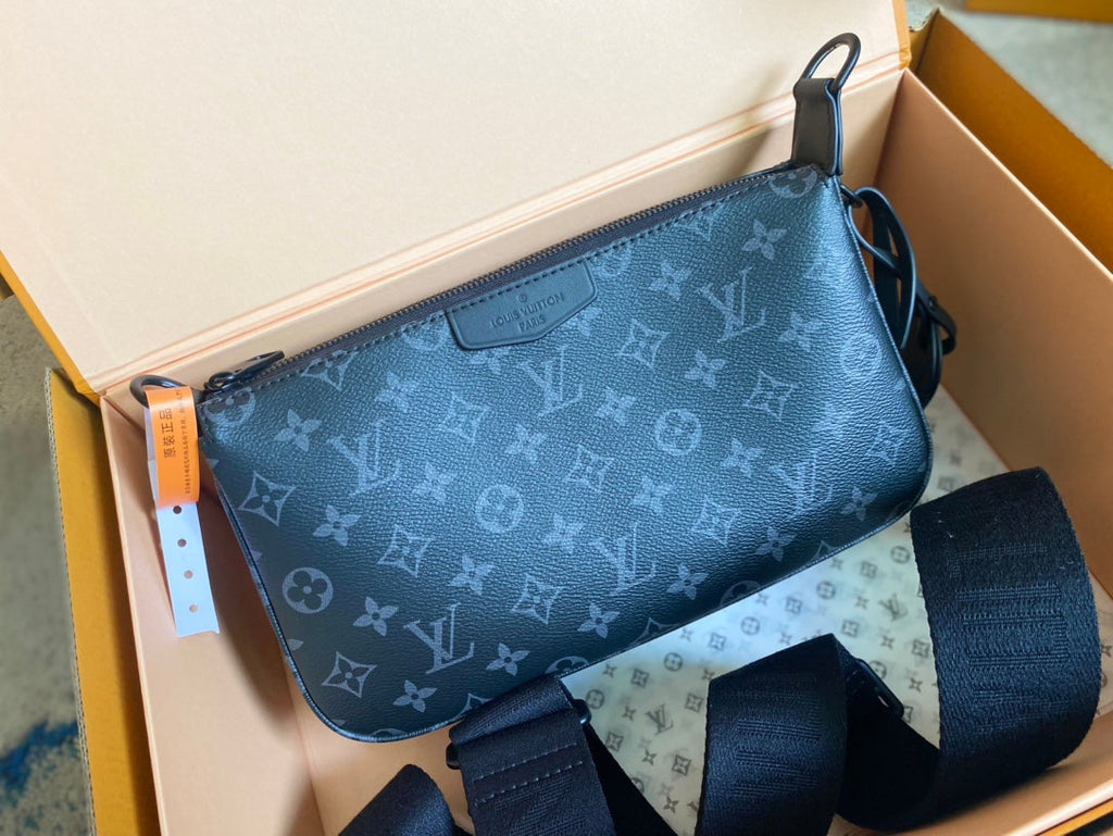 POCHETTE ACCESSOIRE XL 28 EN TOILE MONOGRAMME ECLIPSE NOIRE