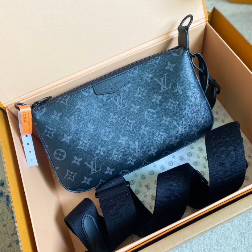 POCHETTE ACCESSOIRE XL 28 EN TOILE MONOGRAMME ECLIPSE NOIRE