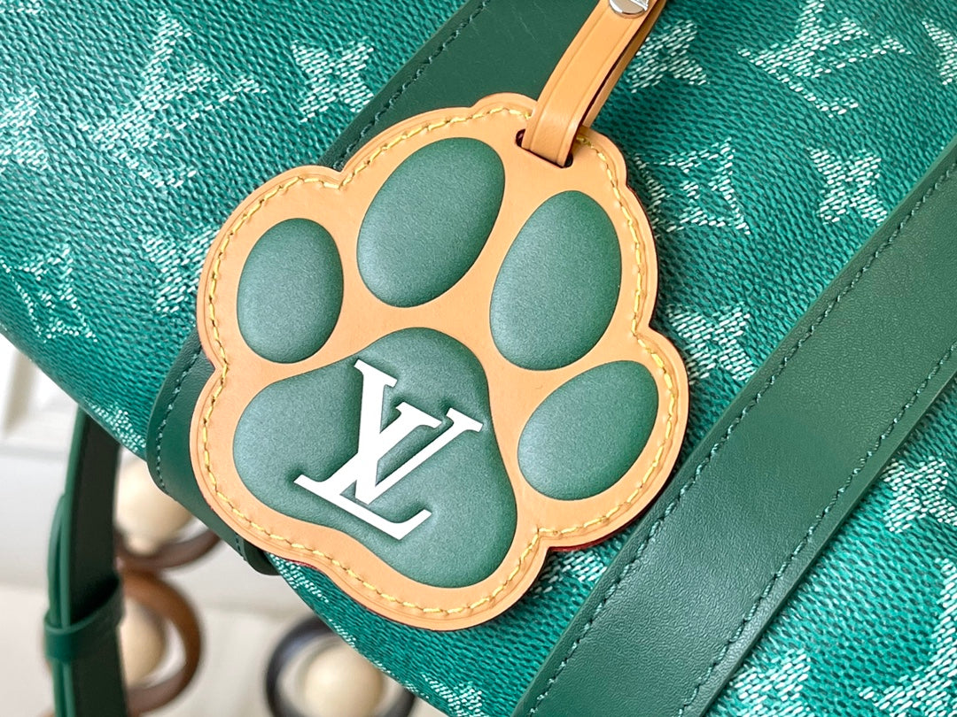 KEEPALL BANDOULIÈRE 25 EN TOILE VERT MONOGRAMME HERITAGE