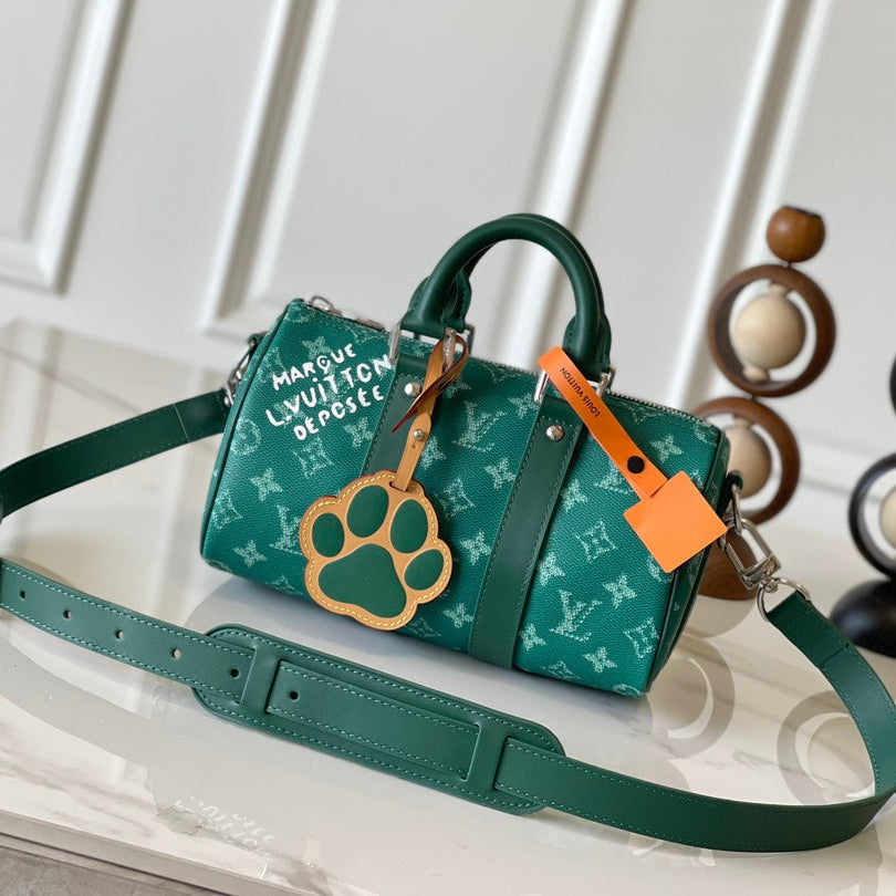 KEEPALL BANDOULIÈRE 25 EN TOILE VERT MONOGRAMME HERITAGE