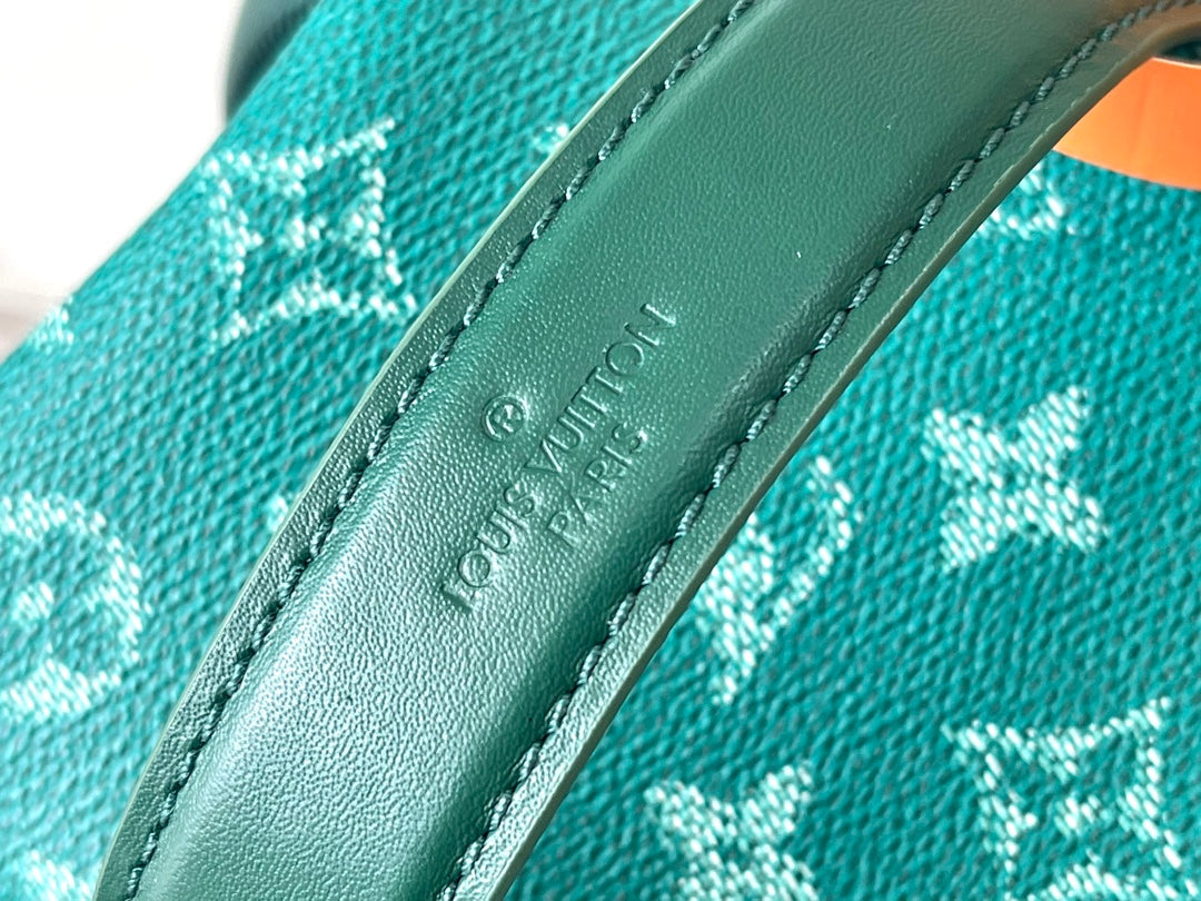 SAC À DOS DISCOVERY 38 EN TOILE HERITAGE MONOGRAMME VERTE