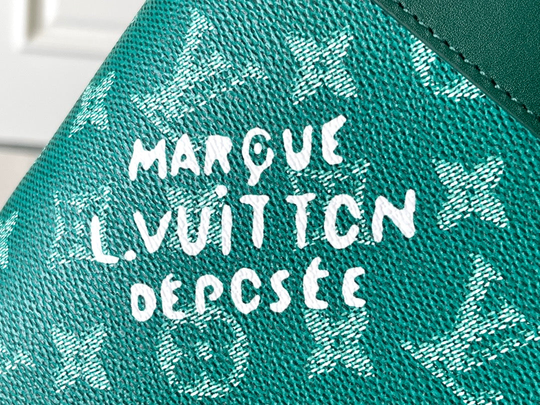 POCHETTE VOYAGE SOUPLE 32 EN TOILE MONOGRAMME VERTE HERITAGE