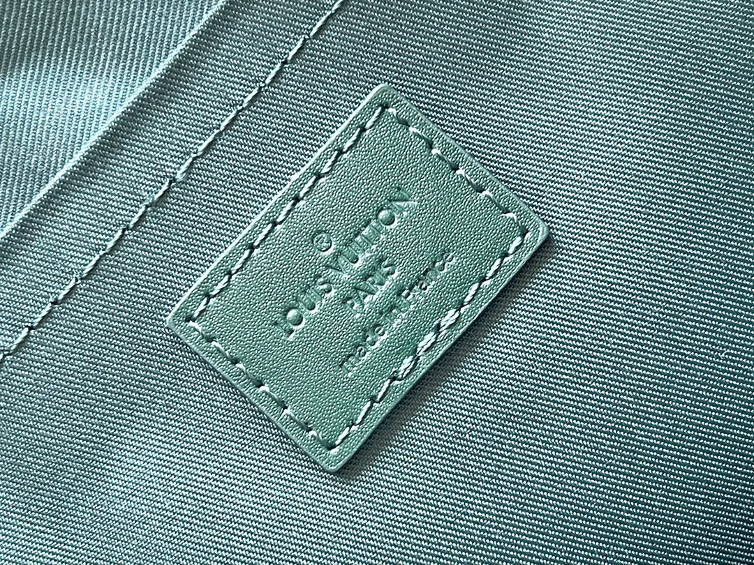 POCHETTE VOYAGE SOUPLE 32 EN TOILE MONOGRAMME VERTE HERITAGE