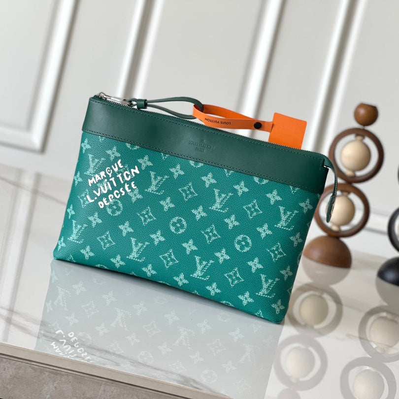 POCHETTE VOYAGE SOUPLE 32 EN TOILE MONOGRAMME VERTE HERITAGE