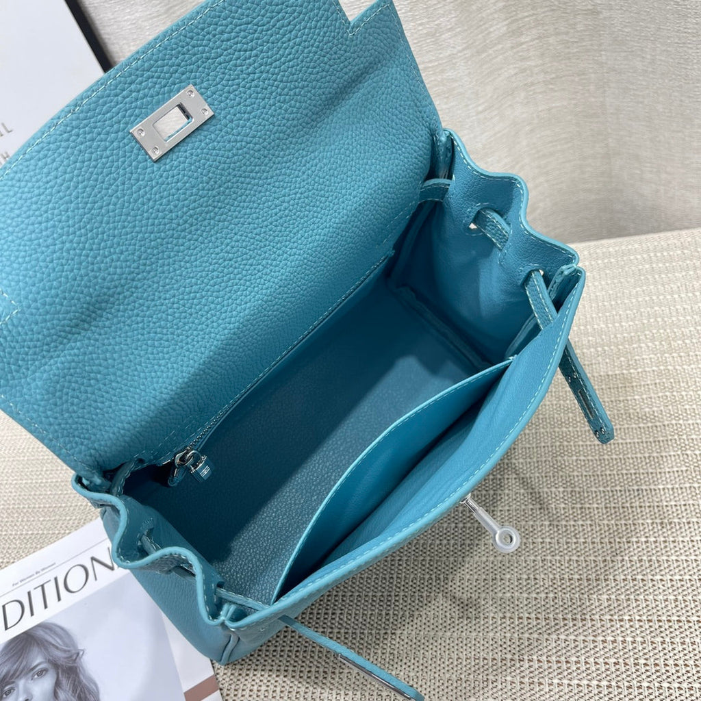 HM KELLY 25CM RETOURNE TURQUOISE TOGO LEATHER SILVER HARDWARE