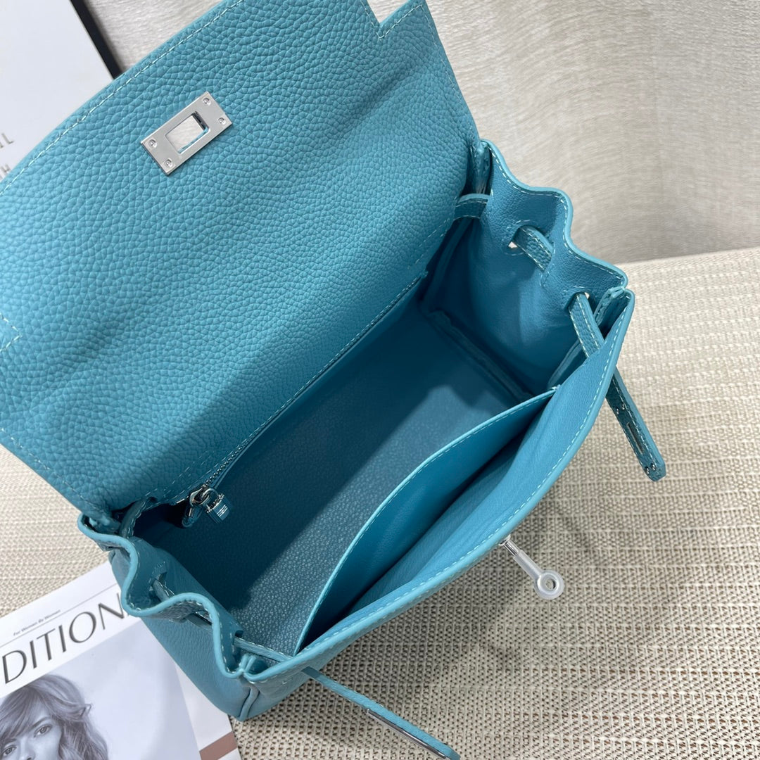HM KELLY 25CM RETOURNE TURQUOISE TOGO LEATHER SILVER HARDWARE