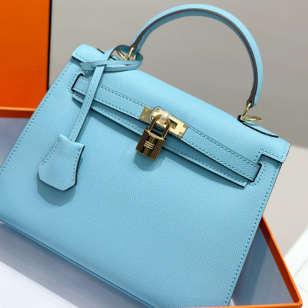 Sac HM Kelly 25 cm en cuir EPSOM bleu Tiffany, accessoires dorés