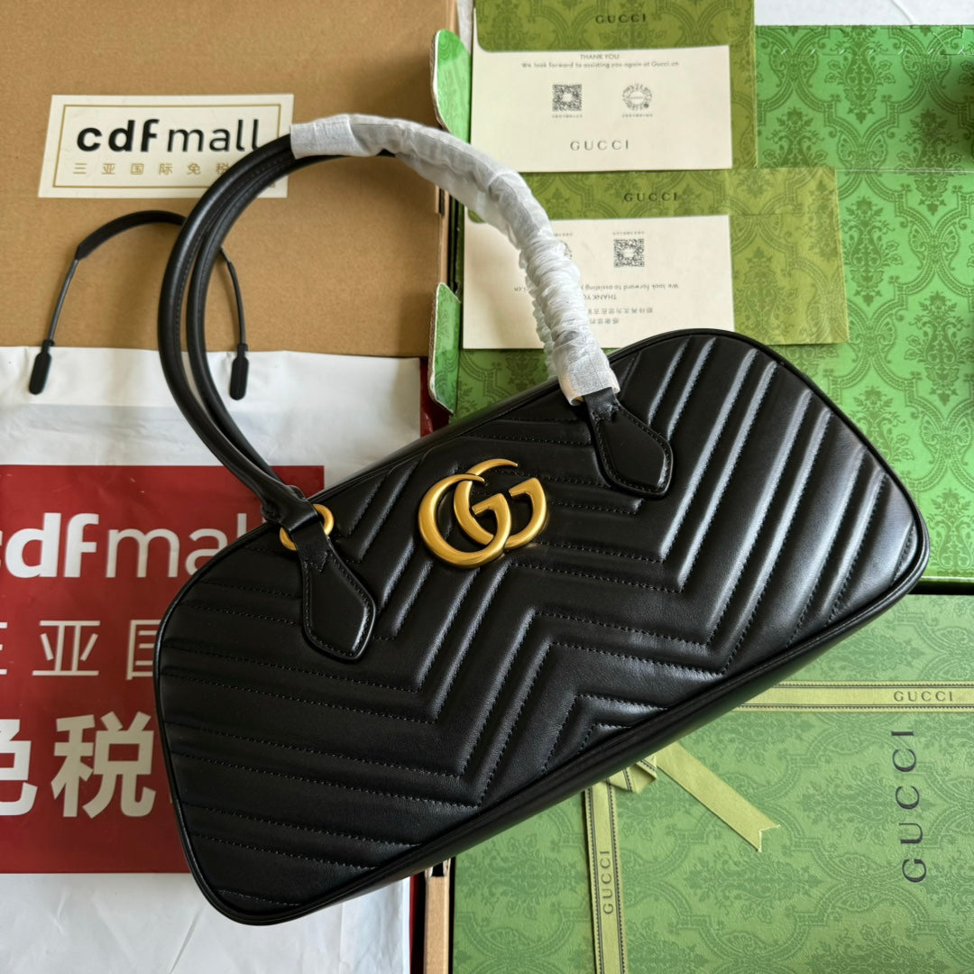 Sac à main GG Marmont Medium avec poignée supérieure 35 cm en cuir de veau noir et matériel doré