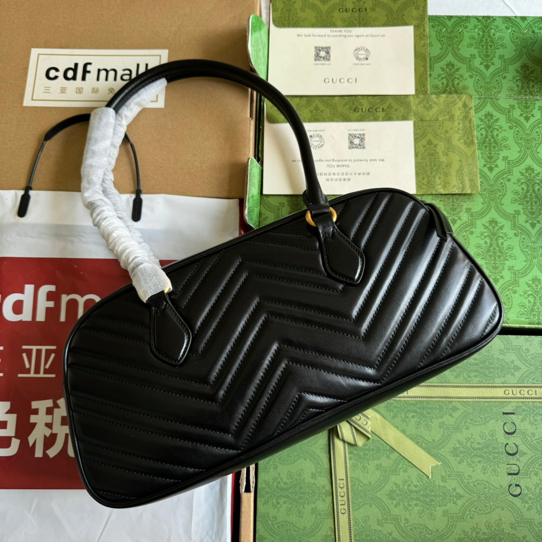Sac à main GG Marmont Medium avec poignée supérieure 35 cm en cuir de veau noir et matériel doré