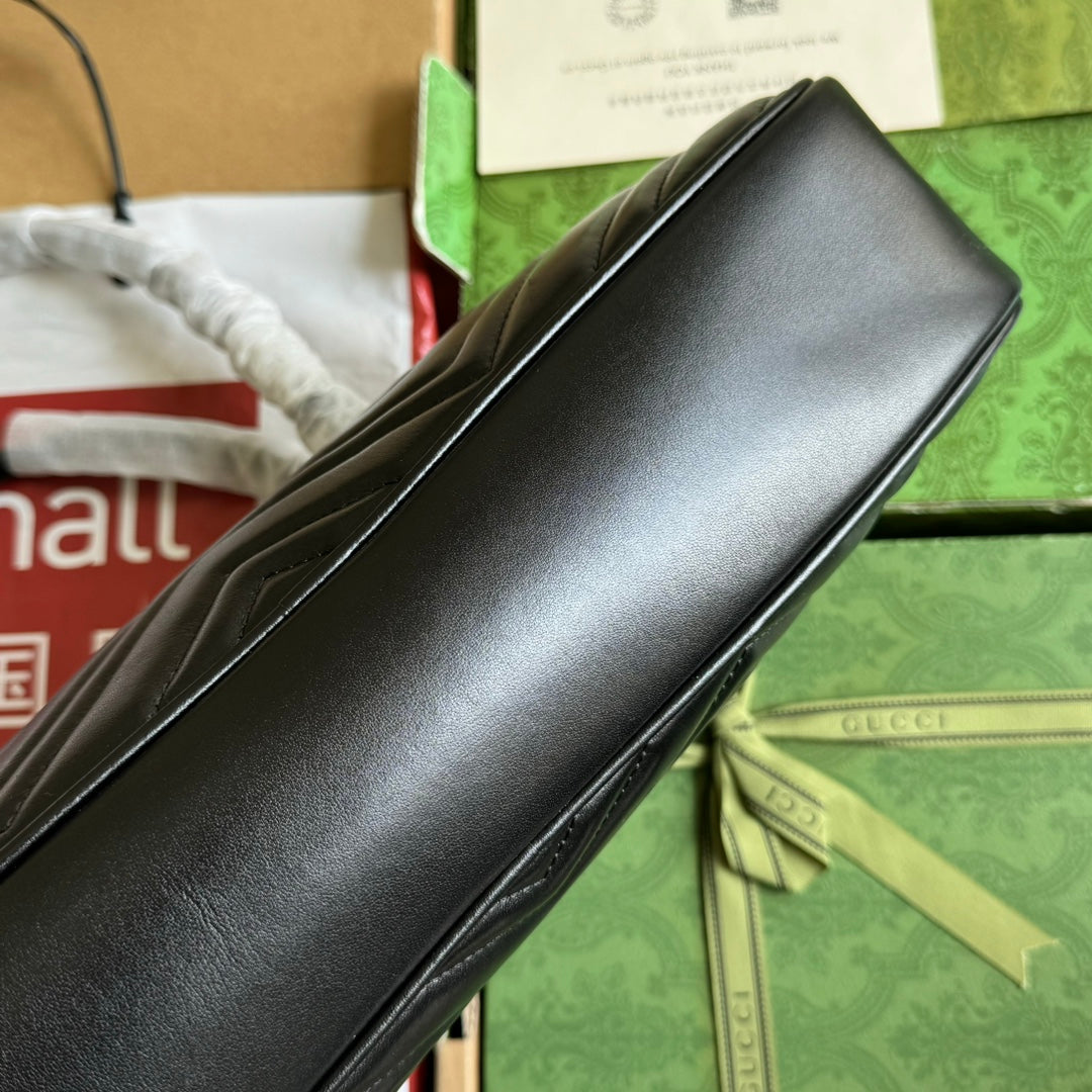 Sac à main GG Marmont Medium avec poignée supérieure 35 cm en cuir de veau noir et matériel doré