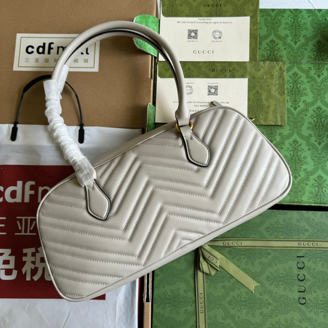 Sac à main GG Marmont Medium avec poignée supérieure 35 cm en cuir de veau crème et quincaillerie dorée
