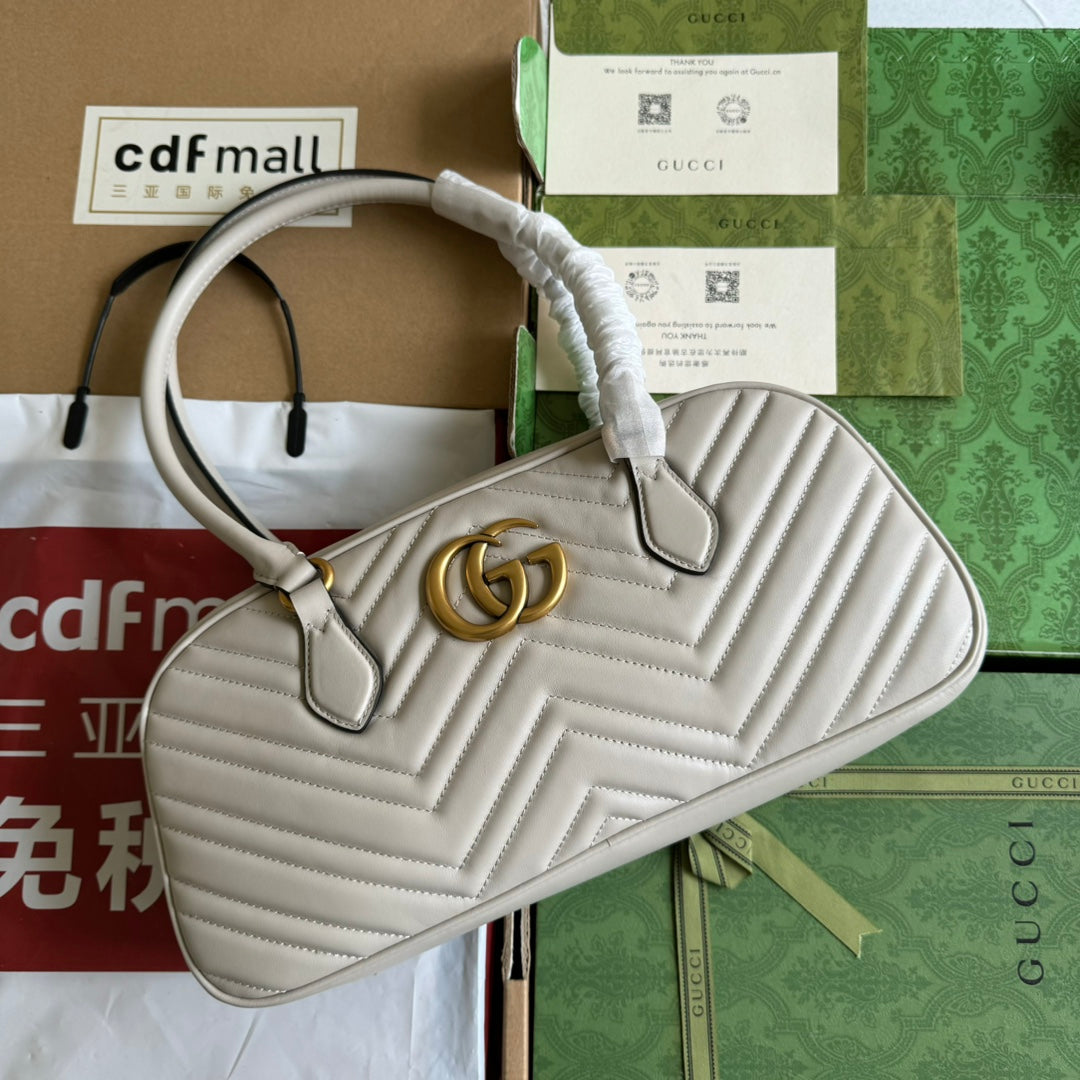 Sac à main GG Marmont Medium avec poignée supérieure 35 cm en cuir de veau crème et quincaillerie dorée