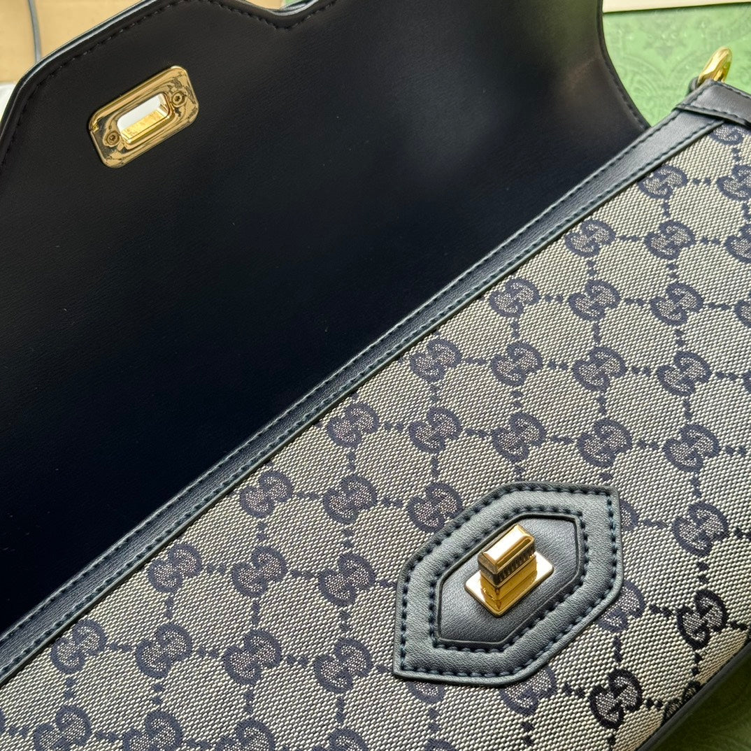 SAC À BANDOULIÈRE MOYEN LUCE 36 EN TOILE GRIS CLAIR ET GARNITURE EN CUIR DE VEAU NOIR, QUINCAILLERIE DORÉ