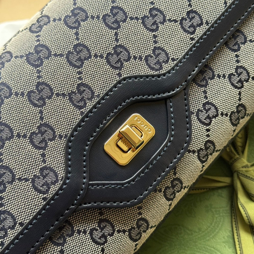 SAC À BANDOULIÈRE MOYEN LUCE 36 EN TOILE GRIS CLAIR ET GARNITURE EN CUIR DE VEAU NOIR, QUINCAILLERIE DORÉ