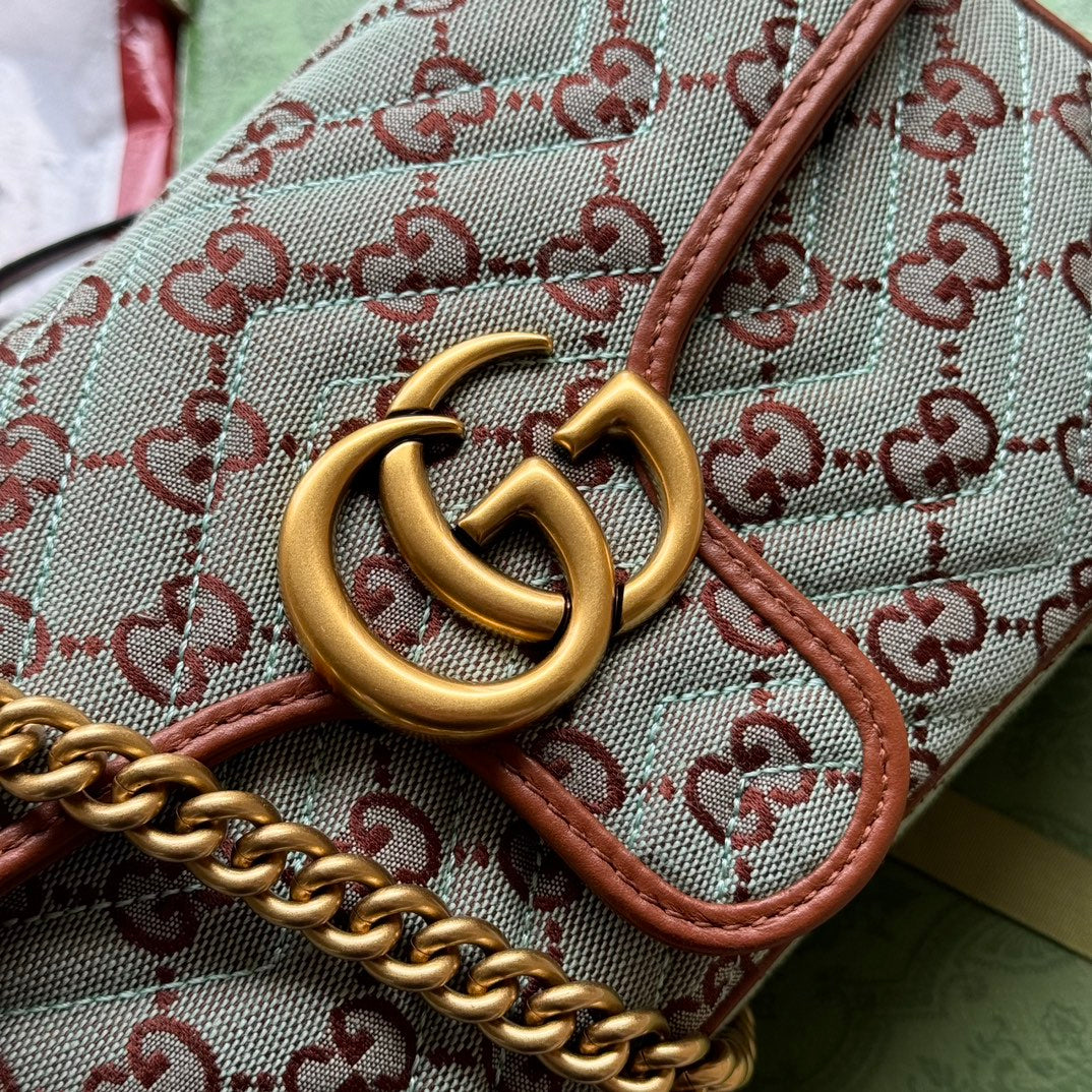 Toile monogrammée GG Marmont 26 cm bleu chocolat avec quincaillerie dorée