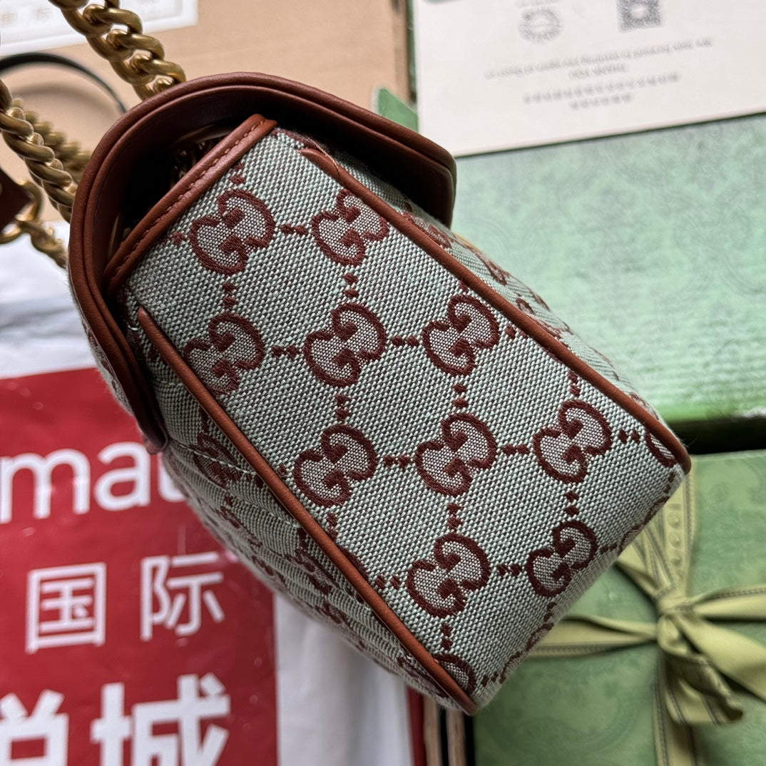 Toile monogrammée GG Marmont 26 cm bleu chocolat avec quincaillerie dorée