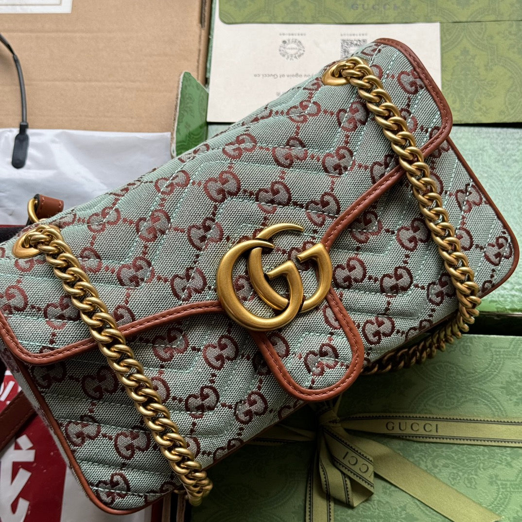 Toile monogrammée GG Marmont 26 cm bleu chocolat avec quincaillerie dorée
