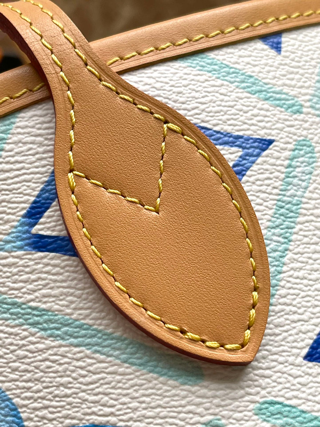 NEVERFULL MM 31 EN TOILE À CARREAUX MONOGRAMME BLEU LAGON