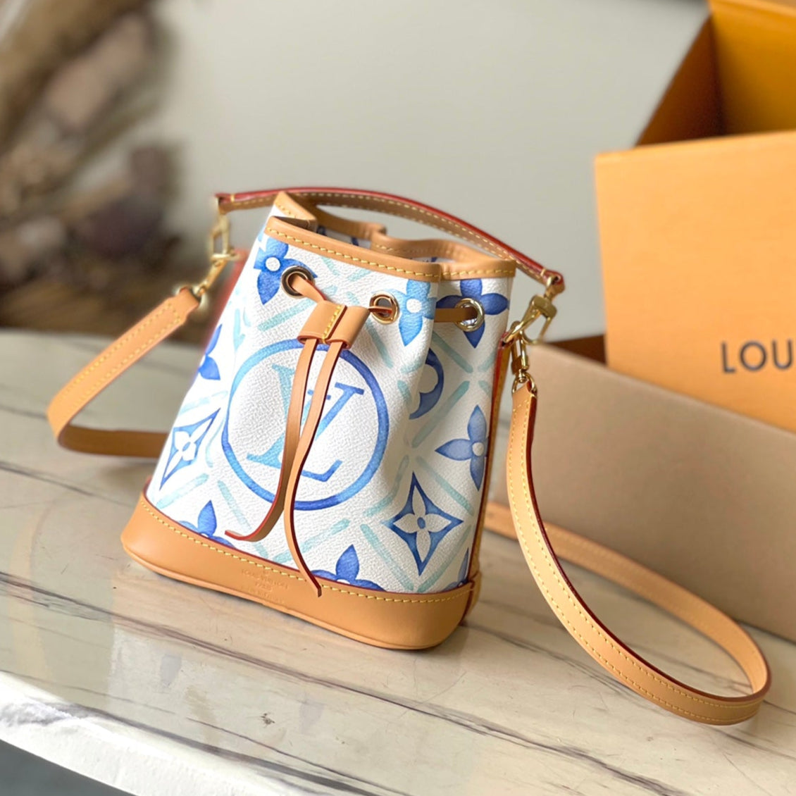 NANO NOÉ 16 EN TOILE À CARREAUX MONOGRAMME BLEU LAGON