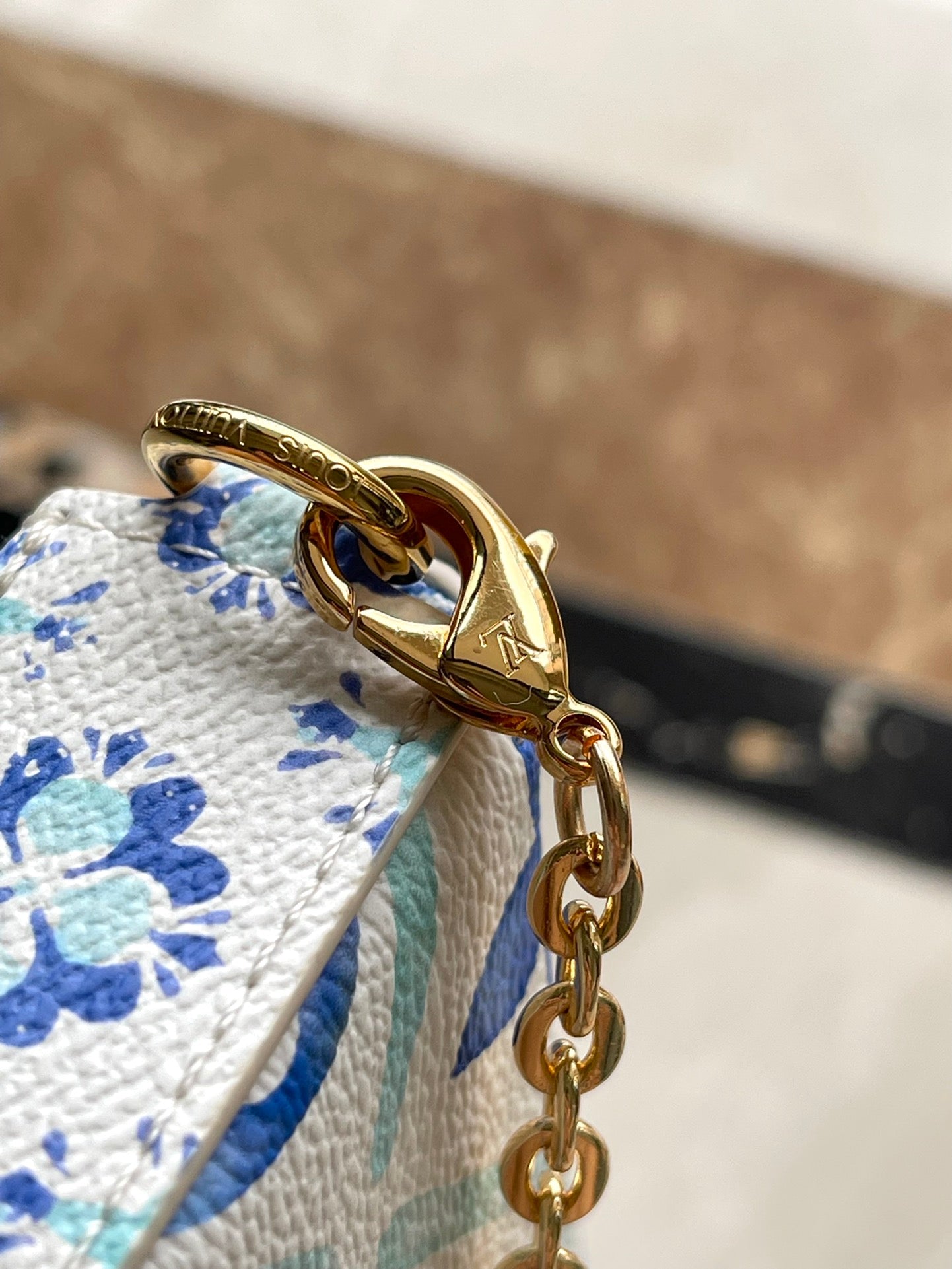 FÉLICIE POCHETTE 21 EN TOILE CARREAUX MONOGRAMME BLEU LAGON