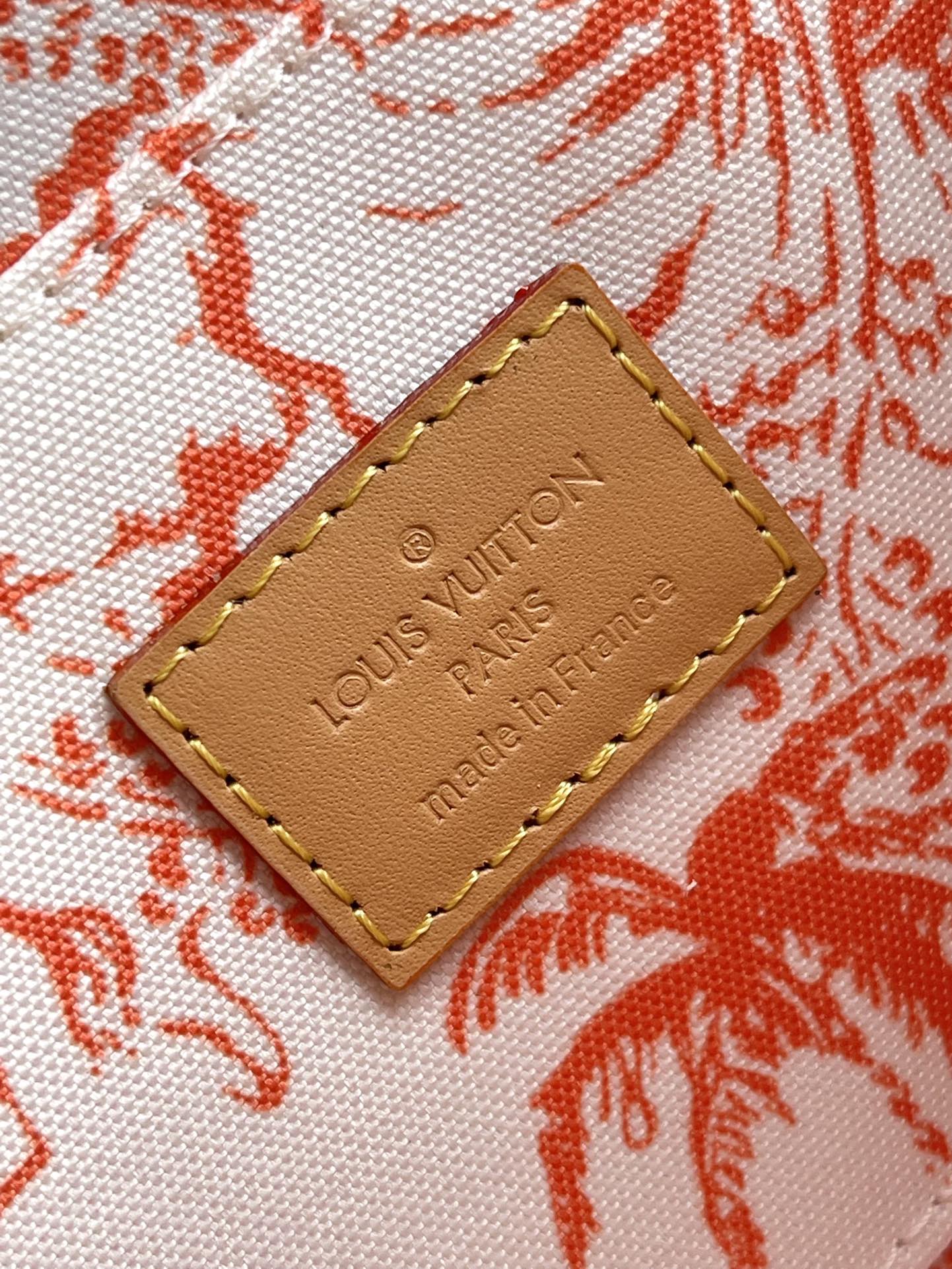 FÉLICIE POCHETTE 21 EN TOILE CARREAUX MONOGRAMME CORAIL