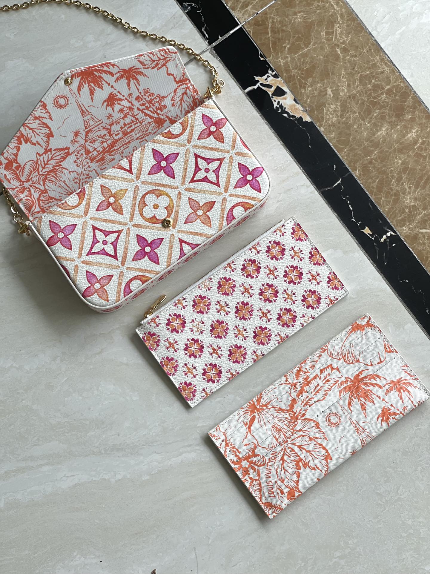 FÉLICIE POCHETTE 21 EN TOILE CARREAUX MONOGRAMME CORAIL