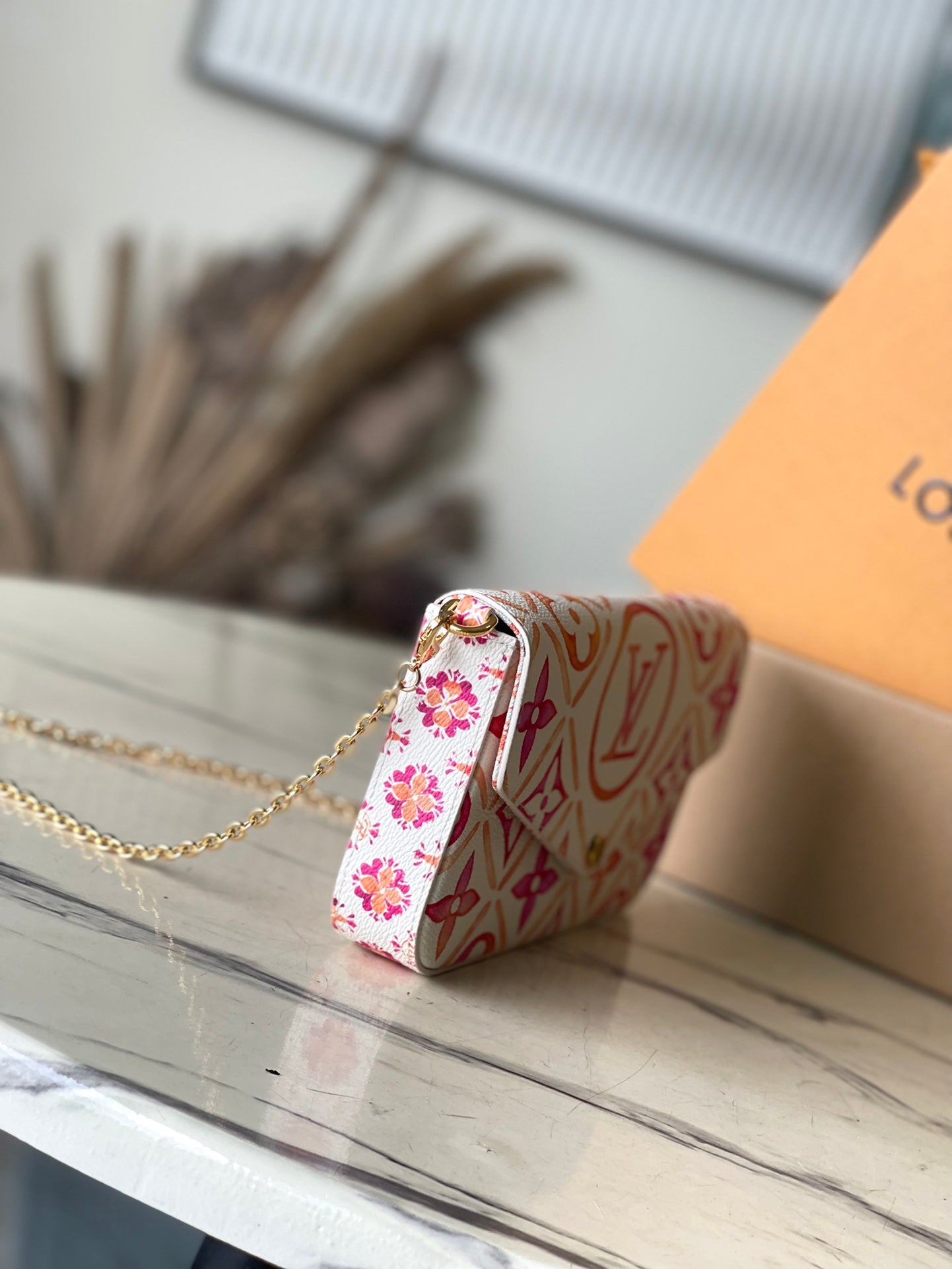 FÉLICIE POCHETTE 21 EN TOILE CARREAUX MONOGRAMME CORAIL