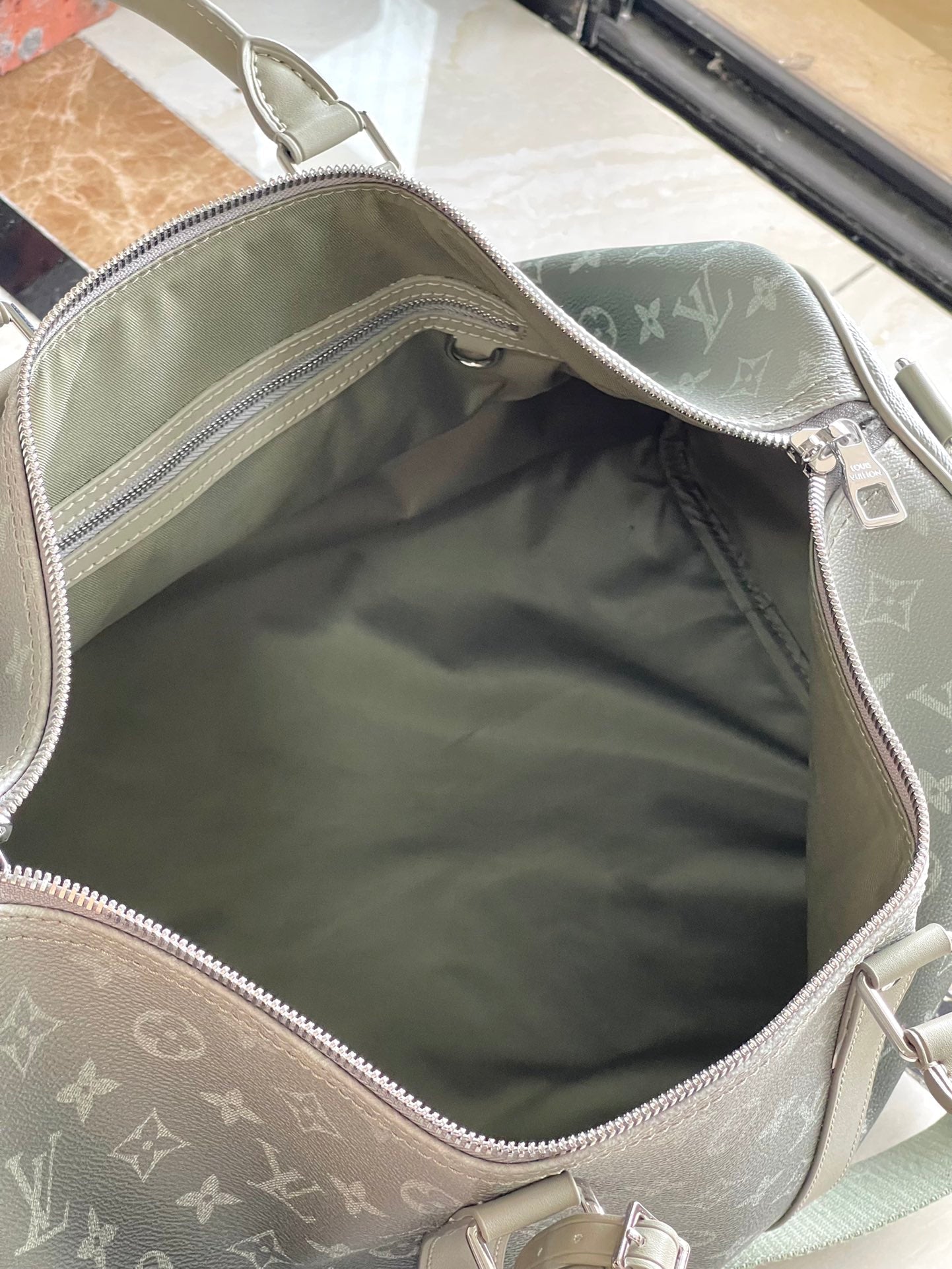 KEEPALL BANDOULIÈRE 45 EN TOILE GRIS DÉGRADÉ MONOGRAMME