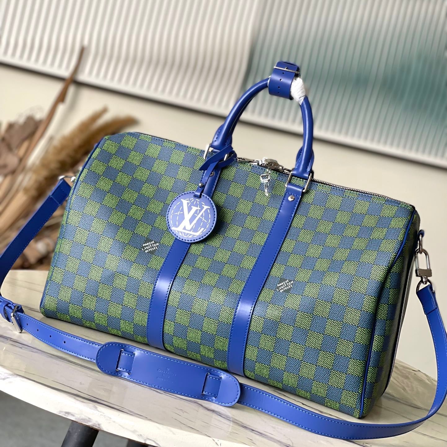 SAC BANDOULIÈRE KEEPALL 45 EN TOILE ENDUITE DAMIER HÉRITAGE BLEU VERT