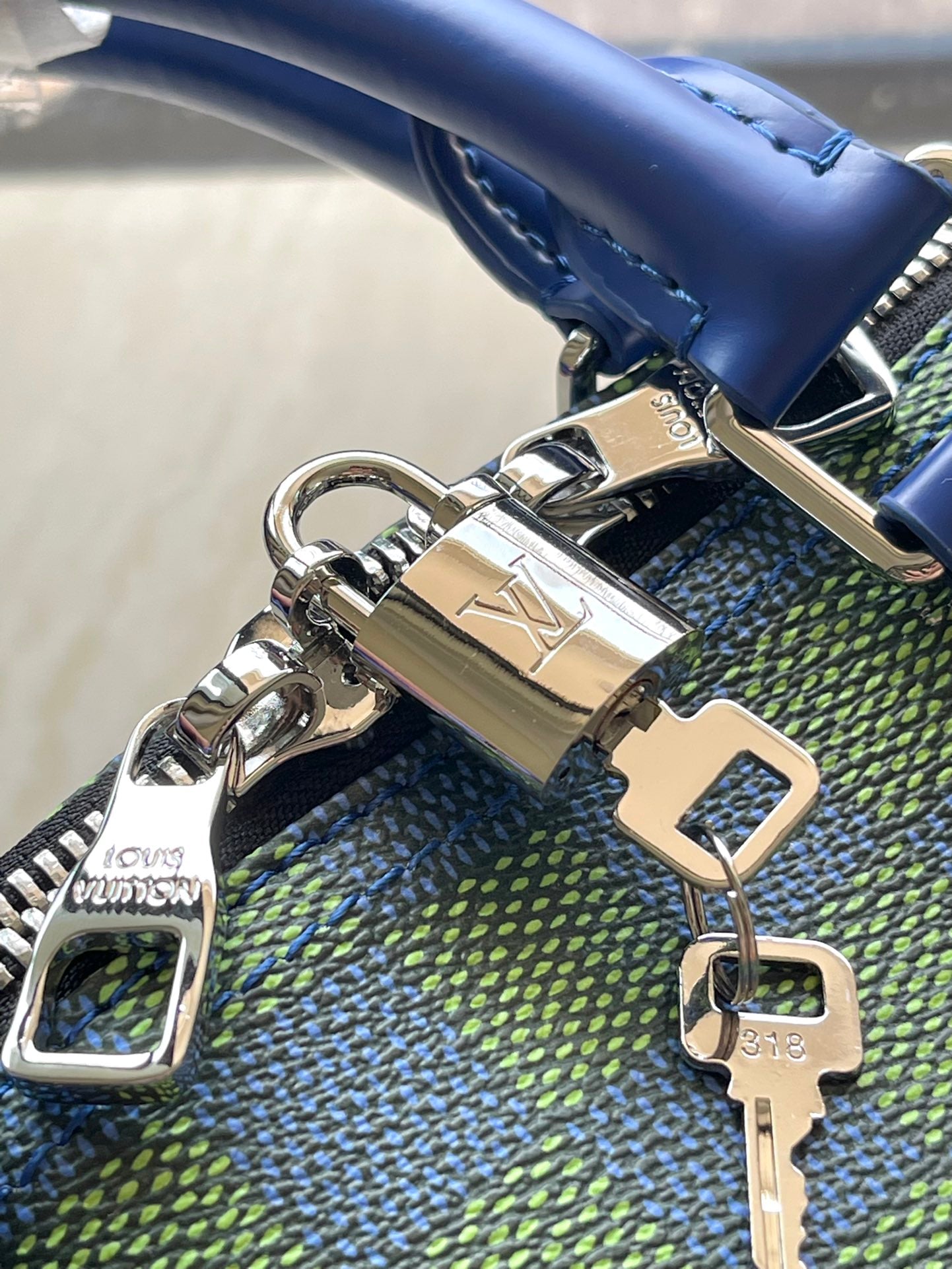 SAC BANDOULIÈRE KEEPALL 45 EN TOILE ENDUITE DAMIER HÉRITAGE BLEU VERT