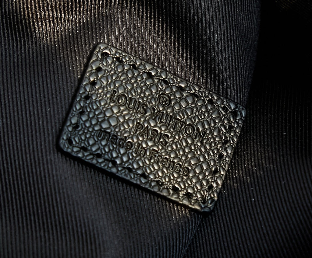 SAC À BANDOULIÈRE DUO 42 EN TOILE MONOGRAMME ECLIPSE NOIRE