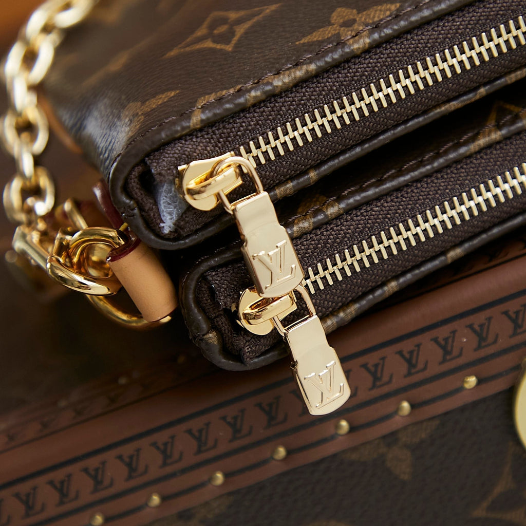 POCHETTE LIV 24 EN TOILE MONOGRAMME MARRON QUINCAILLERIE DORÉ