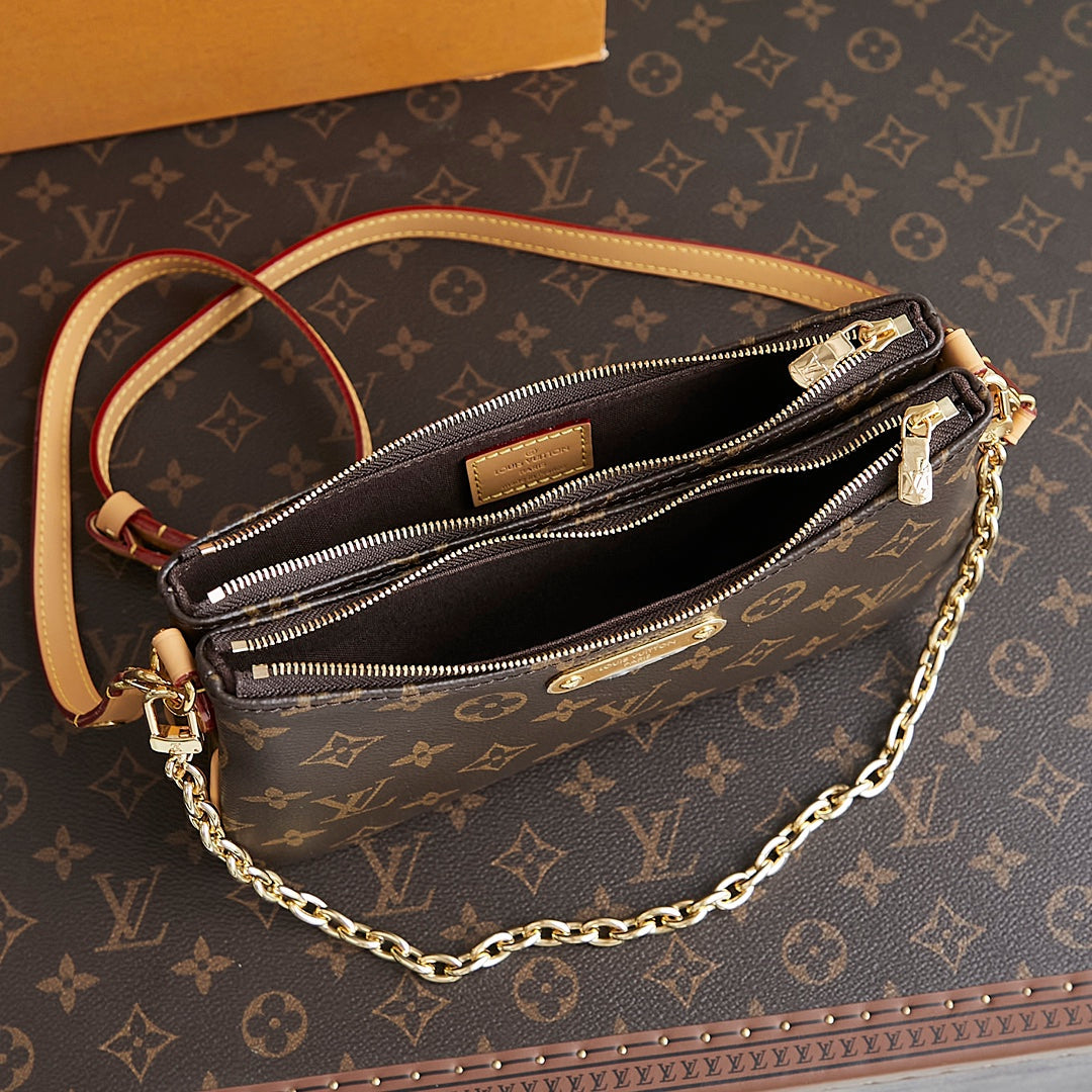 POCHETTE LIV 24 EN TOILE MONOGRAMME MARRON QUINCAILLERIE DORÉ