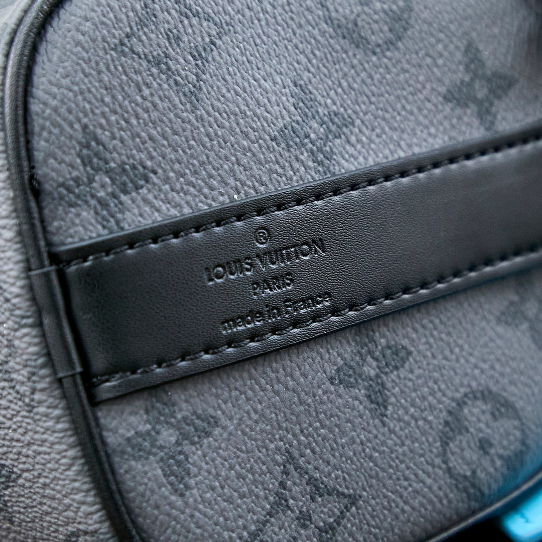 SAC BANDOULIÈRE KEEPALL 25 EN TOILE ÉCLIPSE MONOGRAMME GUN METAL CUIR DE VEAU TURQUOISE MIXTE