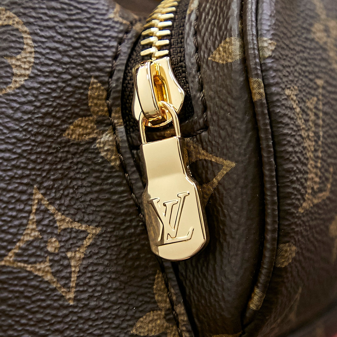 MINI SAC À DOS MONTSOURIS 25 EN TOILE MONOGRAMME MARRON