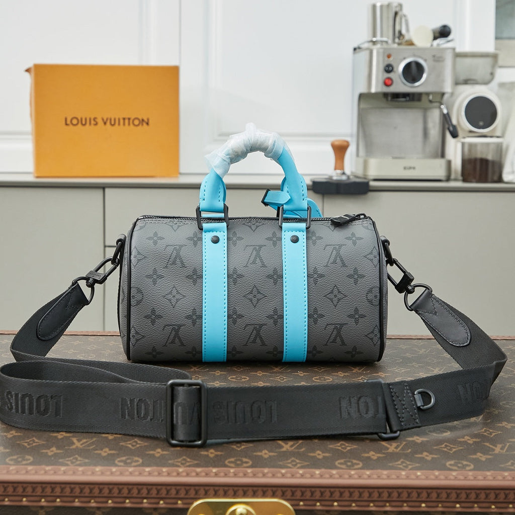 SAC BANDOULIÈRE KEEPALL 25 EN TOILE ÉCLIPSE MONOGRAMME GUN METAL CUIR DE VEAU TURQUOISE MIXTE