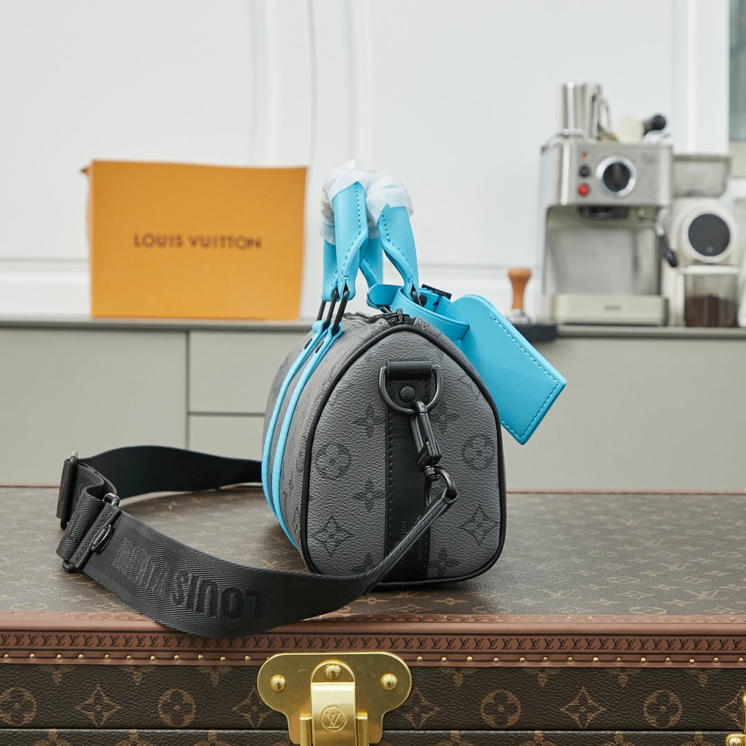 SAC BANDOULIÈRE KEEPALL 25 EN TOILE ÉCLIPSE MONOGRAMME GUN METAL CUIR DE VEAU TURQUOISE MIXTE