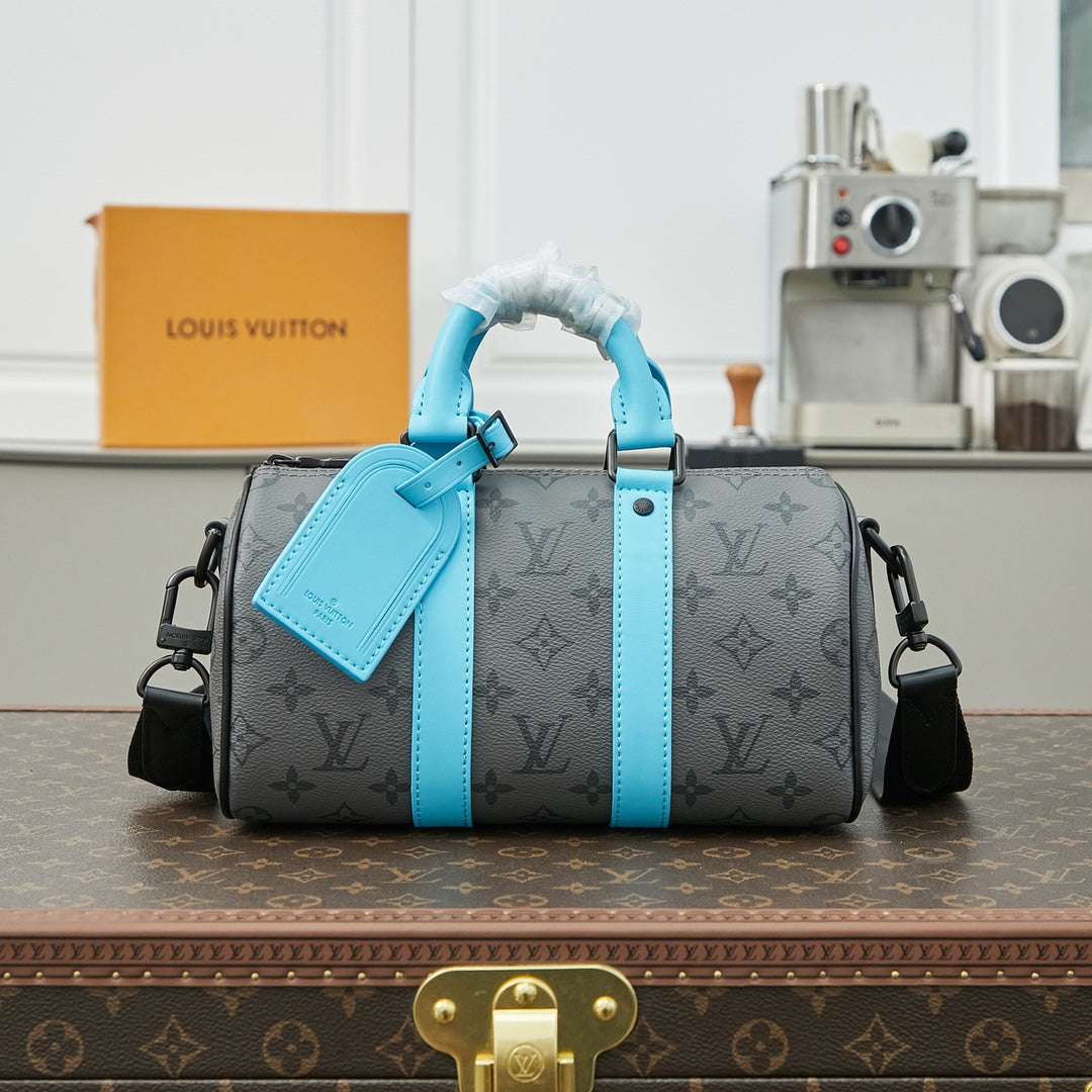SAC BANDOULIÈRE KEEPALL 25 EN TOILE ÉCLIPSE MONOGRAMME GUN METAL CUIR DE VEAU TURQUOISE MIXTE
