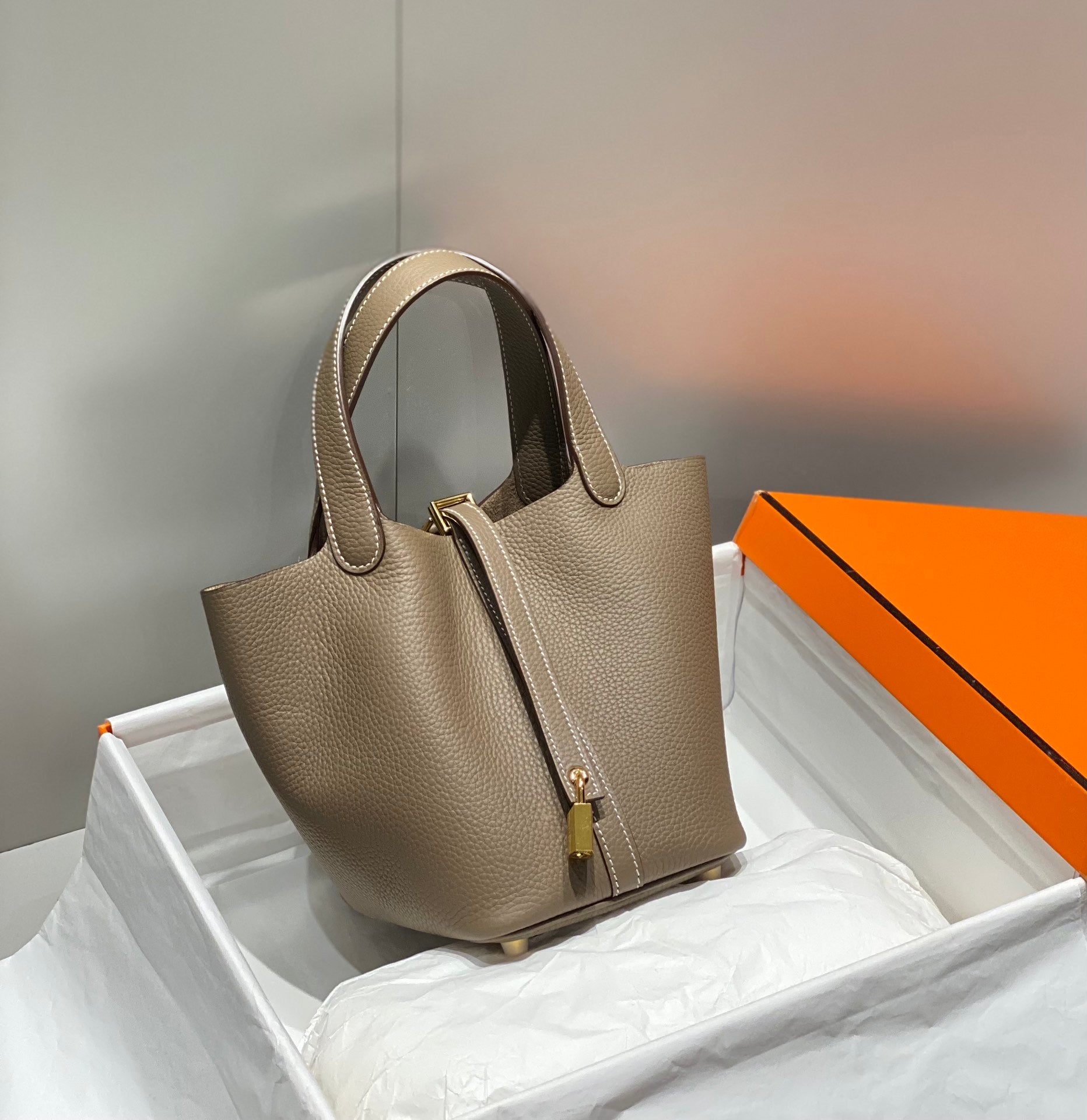 PICOTIN LOCK ETOUPE TOGO CUIR QUINCAILLERIE OR