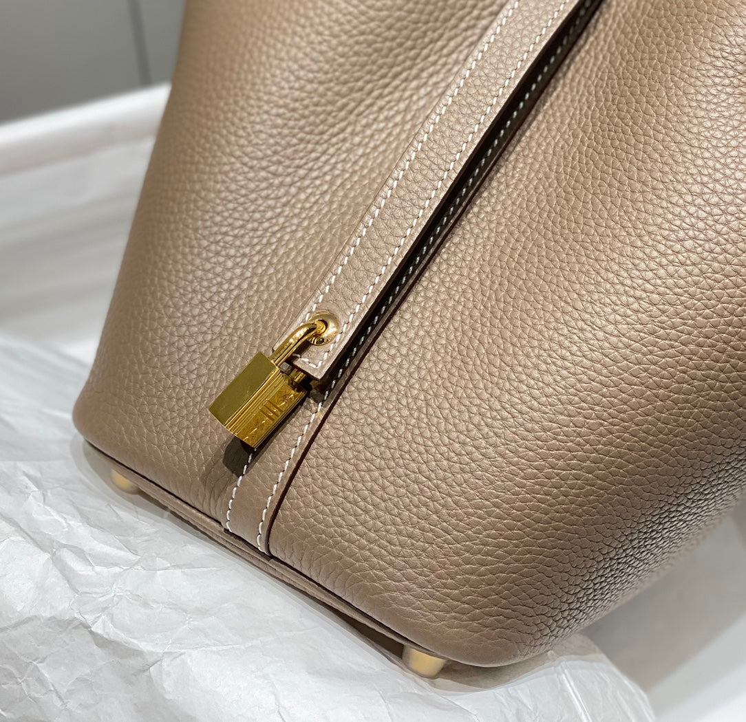 PICOTIN LOCK ETOUPE TOGO CUIR QUINCAILLERIE OR