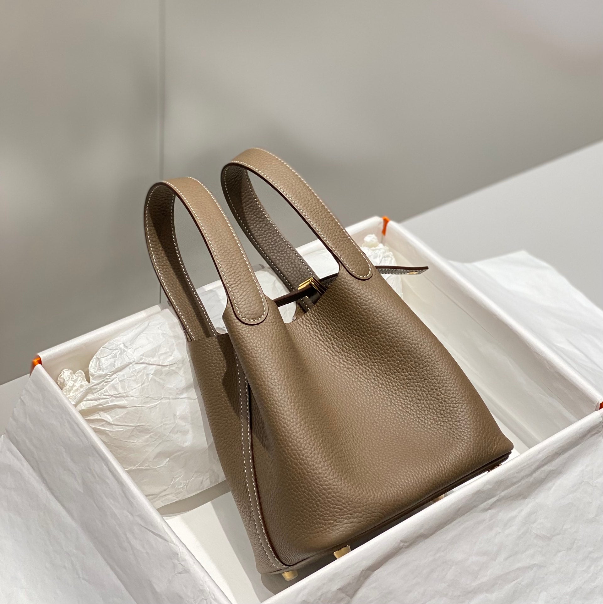 PICOTIN LOCK ETOUPE TOGO CUIR QUINCAILLERIE OR